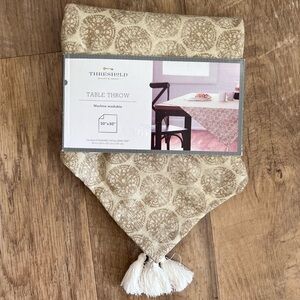 Threshold 50"x50" cotton/linen blend table throw with tassels in cream/beige